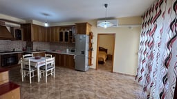Furnished apartment with open space, separate kitchen and air conditioning