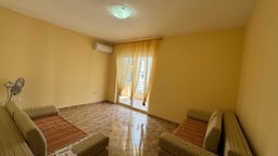 Furnished apartment with open space, separate kitchen and air conditioning