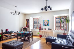 Modern furnished apartment with open kitchen and city view