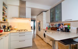 Modern furnished apartment with open kitchen and city view