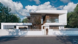 House under construction with exterior structure completed and upper balcony